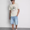 Camiseta con diseño gráfico «Paradise Beach»