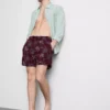 Pantalones cortos con palmeras bordadas