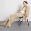 Pantalones holgados con textura y talle medio