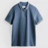 Polo con cuello con cremallera y textura