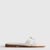 Sandalias tipo mules con tiras trenzadas
