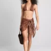 Top de bikini de Paula Echevarría con cuello halter y estampado de leopardo