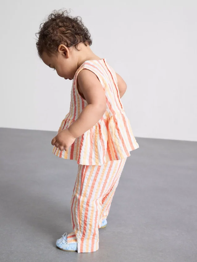 0-36 meses | Conjunto de blusa con peplum a rayas y pantalones