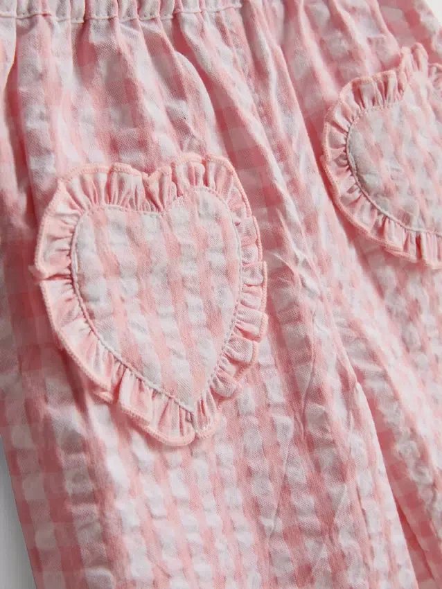 0-36 meses | Conjunto de camiseta con bolsillo en forma de corazón y pantalones