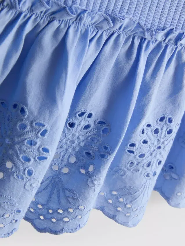 0-36 meses | Conjunto de top sin mangas con ojales y pantalones cortos