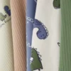 0-36 meses | Paquete de 5 bodies de manga corta con diseño de dinosaurios en pantalones cortos