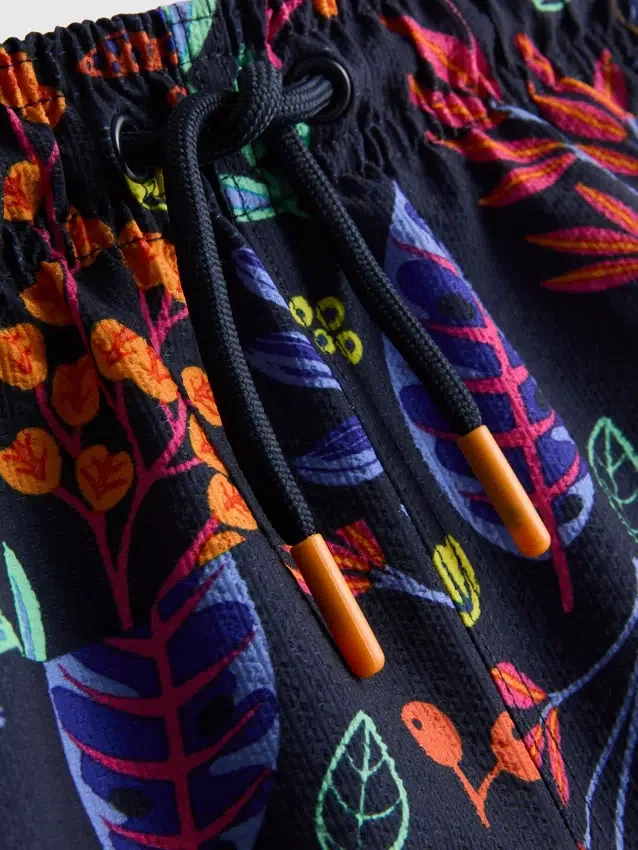 1,5-7 años | pantalones cortos de baño con estampado floral