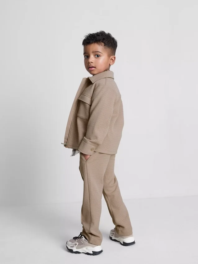 1,5-8 años | Conjunto de chamarra con cremallera y pantalones de chándal de jacquard