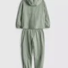 1,5-8 años | Conjunto deportivo con sudadera con capucha y cremallera y pantalones de chándal tipo cargo