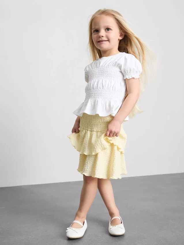 1,5-9 años | Blusa con peplum fruncido