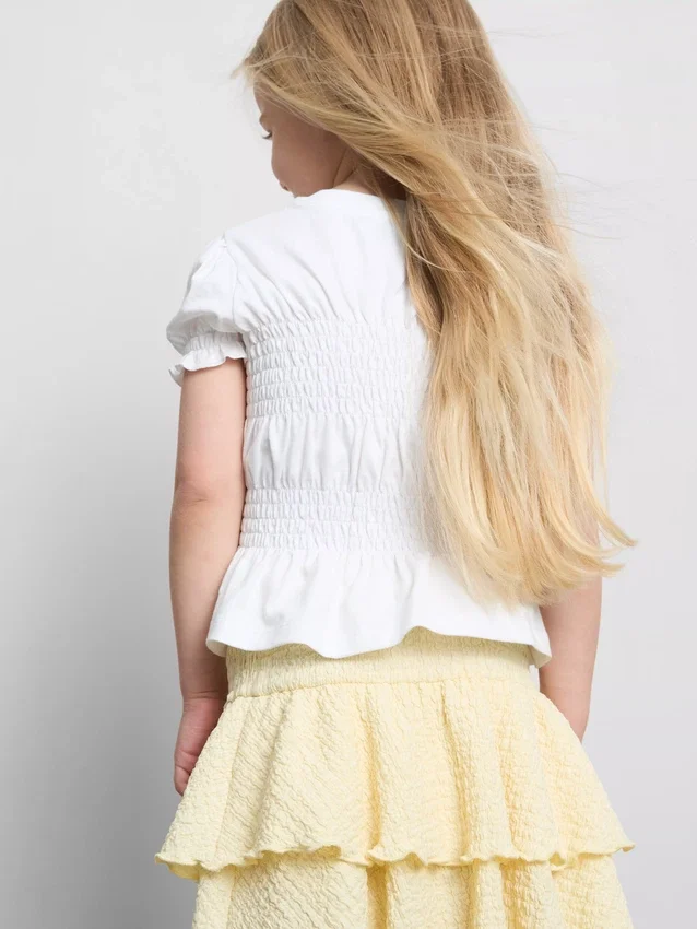 1,5-9 años | Blusa con peplum fruncido