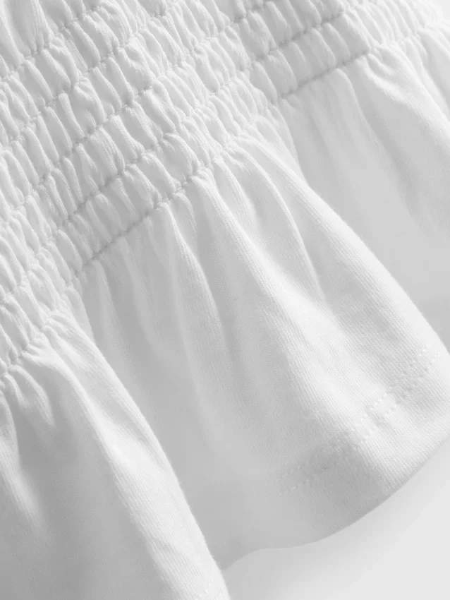 1,5-9 años | Blusa con peplum fruncido