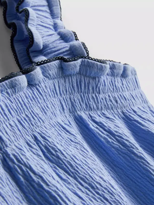 1,5-9 años | Conjunto de blusa y pantalones cortos con textura arrugada