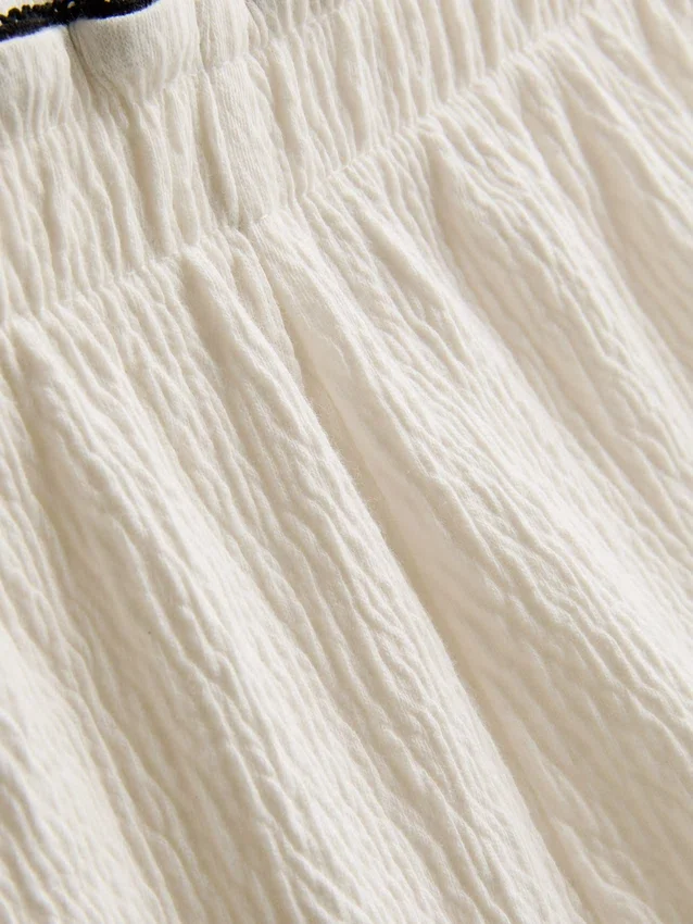 1,5-9 años | Conjunto de blusa y pantalones cortos con textura arrugada