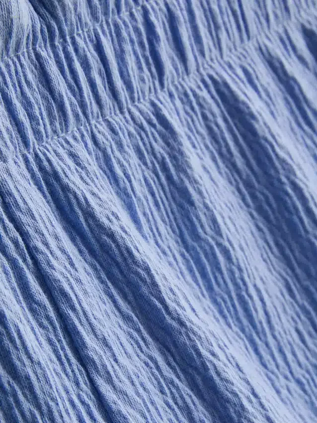 1,5-9 años | Conjunto de blusa y pantalones cortos con textura arrugada