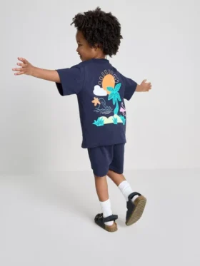 1,5-9 años | Conjunto de camiseta y pantalones cortos con estampado tropical flocado