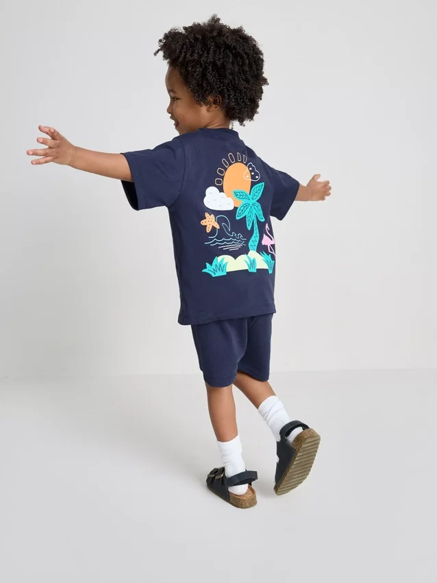 1,5-9 años | Conjunto de camiseta y pantalones cortos con estampado tropical flocado