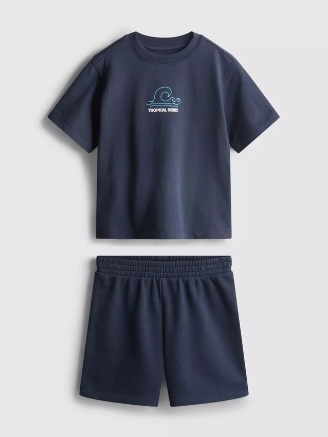 1,5-9 años | Conjunto de camiseta y pantalones cortos con estampado tropical flocado