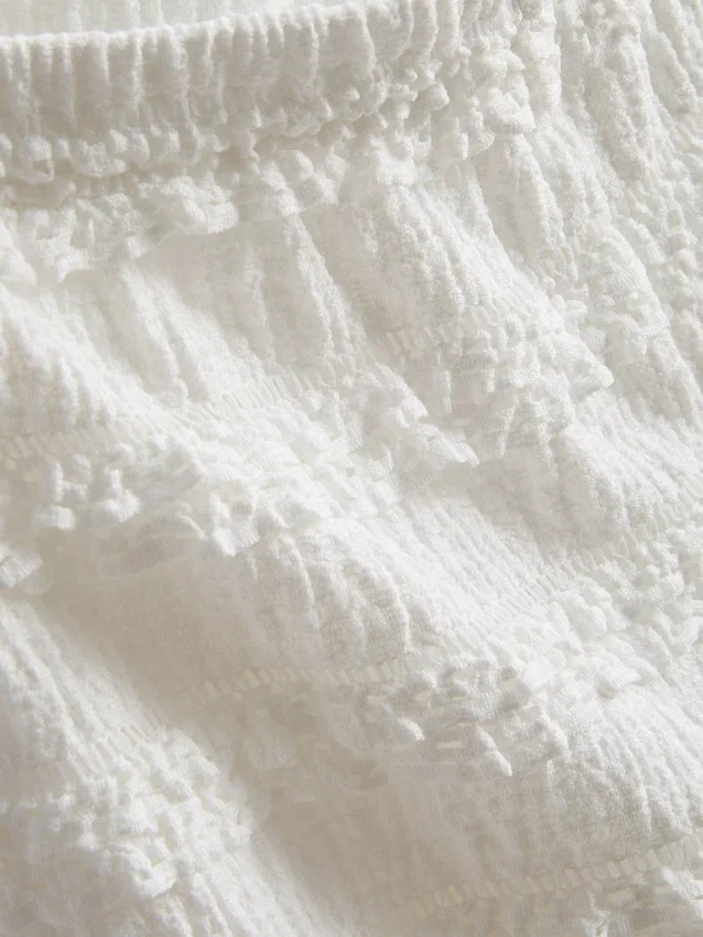 1,5-9 años | Pantalones con volantes y textura arrugada