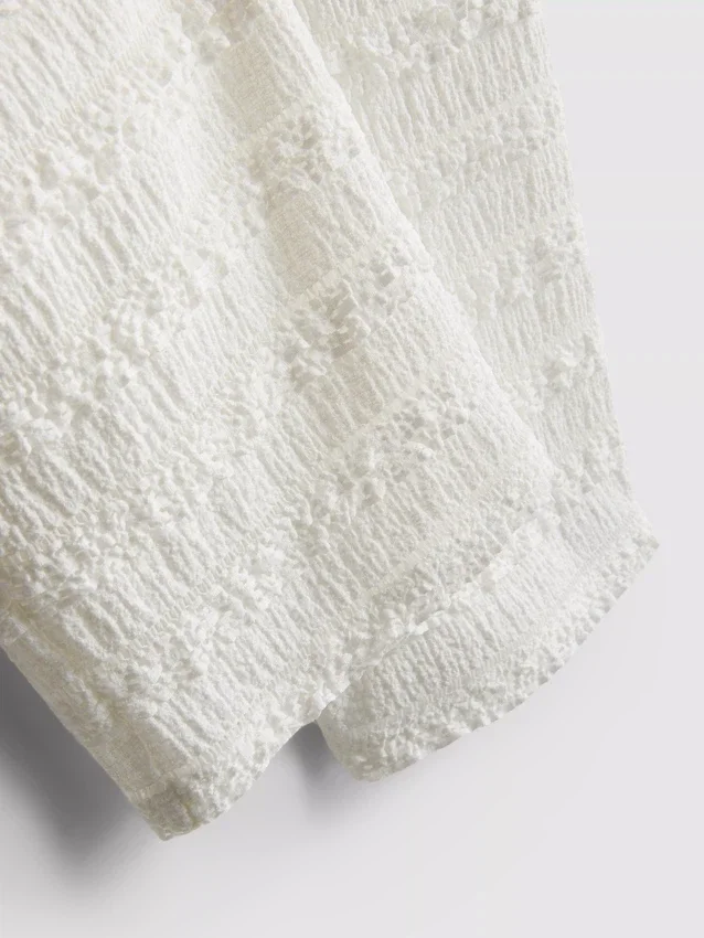 1,5-9 años | Pantalones con volantes y textura arrugada