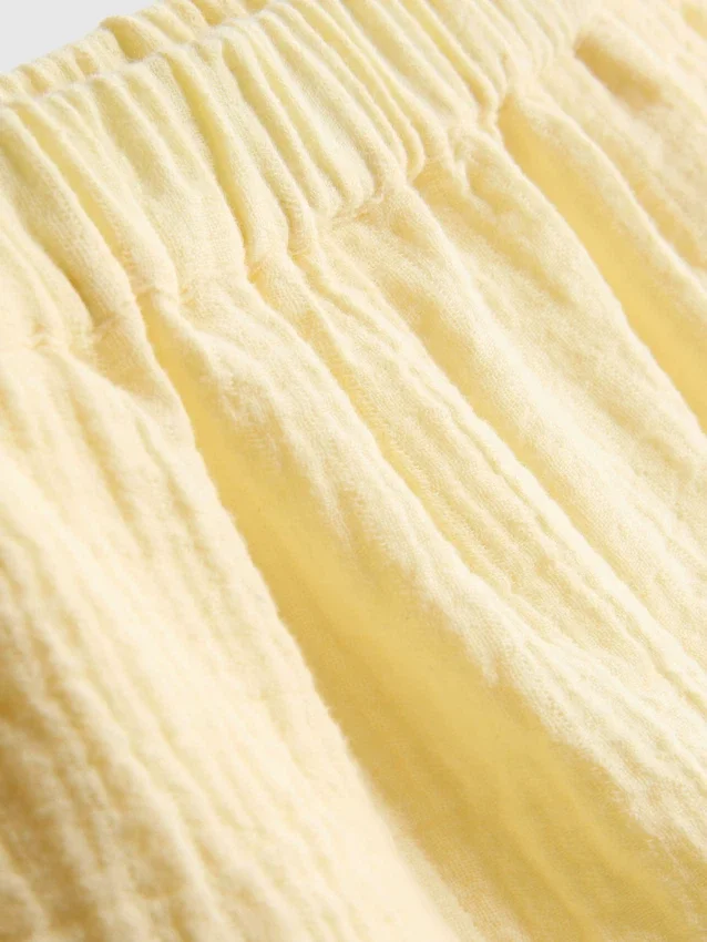 1,5-9 años | Pantalones cortos con ribete festoneado y ojales