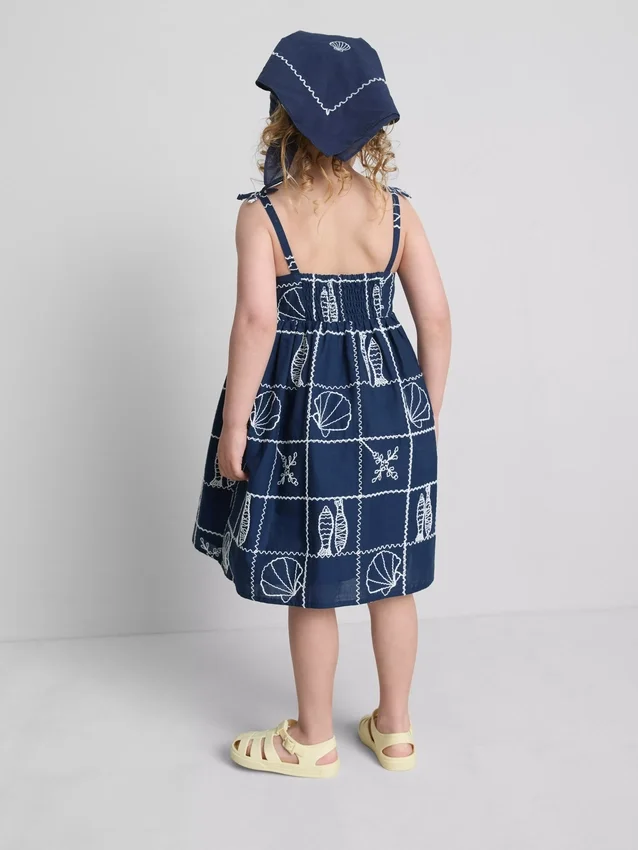 1,5-9 años | Vestido tipo smock con tirantes finos y bordado