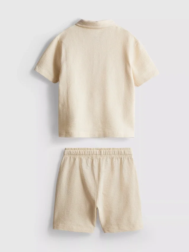 1-9 años | Conjunto de camisa de polo y pantalones cortos con textura
