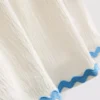 1-9 años | Vestido tipo smock con ribete ondulado