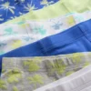 2-15 años | Paquete de 7 trajes de baño con diseño de palmeras