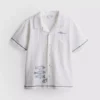 7-15 años | Camisa con bordado de pez