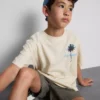7-15 años | Camisa texturizada con estampado de palmeras