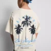 7-15 años | Camisa texturizada con estampado de palmeras