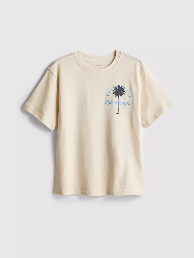 7-15 años | Camisa texturizada con estampado de palmeras