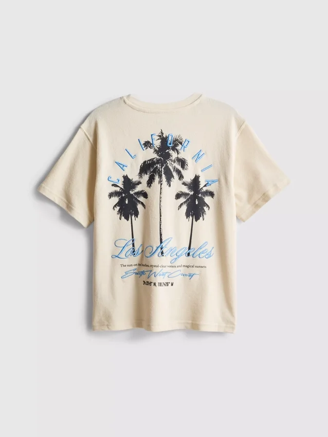 7-15 años | Camisa texturizada con estampado de palmeras