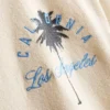 7-15 años | Camisa texturizada con estampado de palmeras