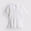 7-15 años | Camiseta con peplum fruncido