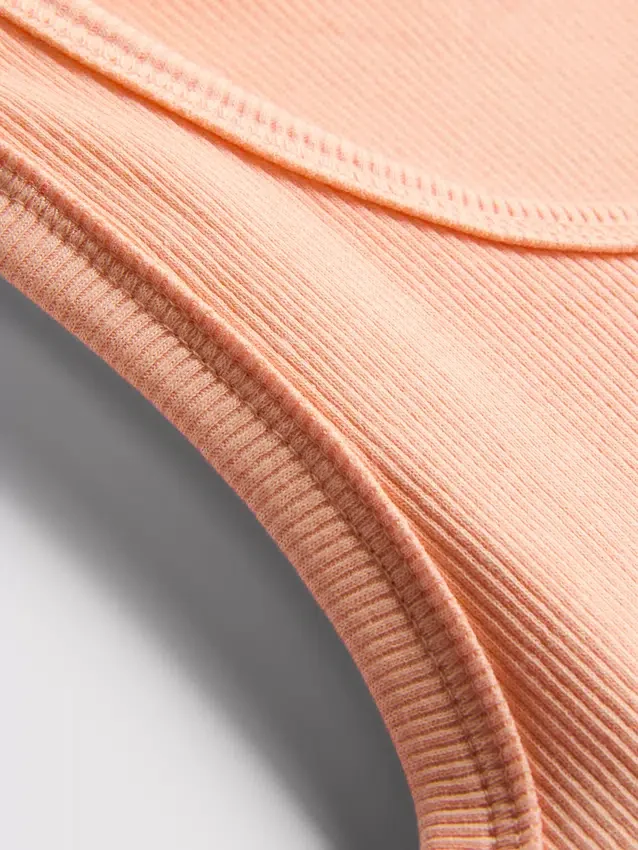 7-15 años | Camiseta sin mangas acanalada con bordado