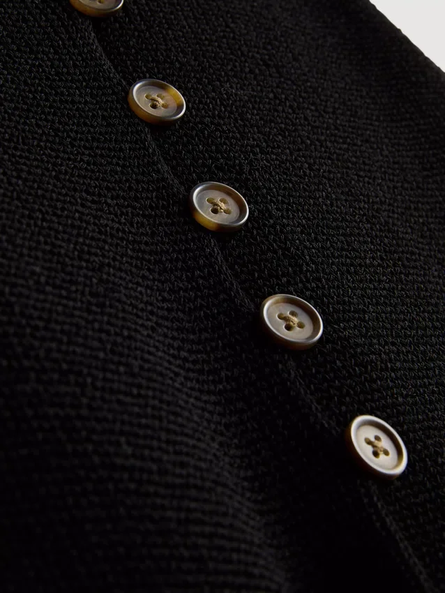 7-15 años | Camiseta sin mangas de punto con cuello en V