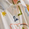7-15 años | Conjunto de camisa y pantalones cortos con detalle de lazo