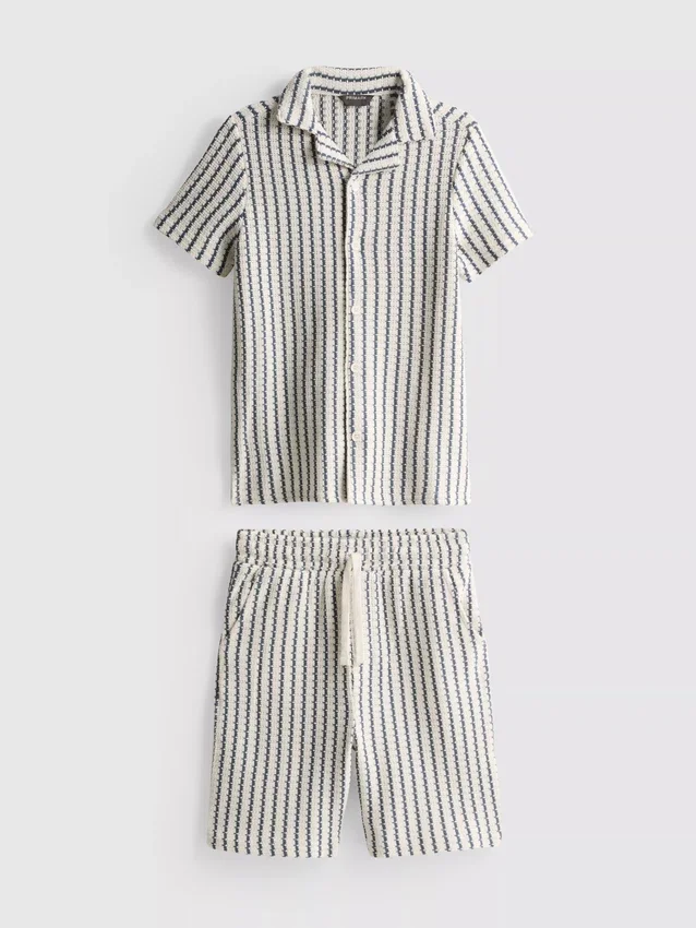7-15 años | Conjunto de camiseta de punto a rayas y pantalones cortos