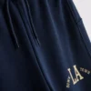 7-15 años | Conjunto de camiseta y pantalones de chándal de pierna ancha