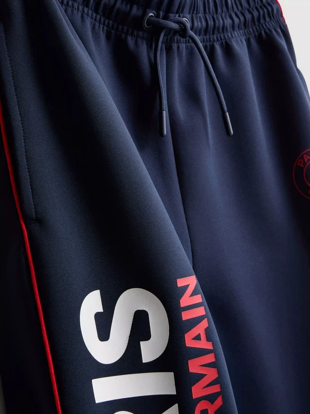 7-15 años | Pantalones de chándal con puños del Paris Saint-Germain F.C.