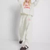 7-15 años | Pantalones de chándal de pierna ancha con estampado «Venice City»