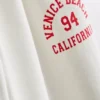 7-15 años | Pantalones de chándal de pierna ancha con estampado «Venice City»