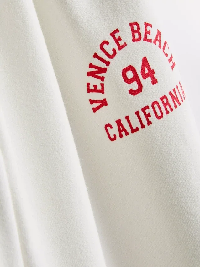 7-15 años | Pantalones de chándal de pierna ancha con estampado «Venice City»