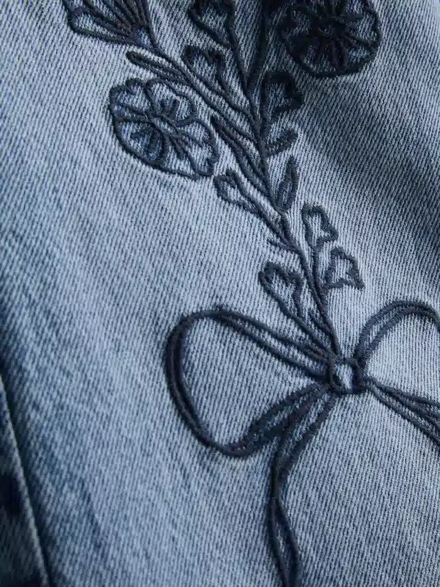 7-15 años | Vaqueros de pierna ancha con lazo floral bordado