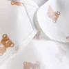 Babero tipo overol con diseño de oso