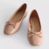 Bailarinas planas con lazo de imitación de cuero