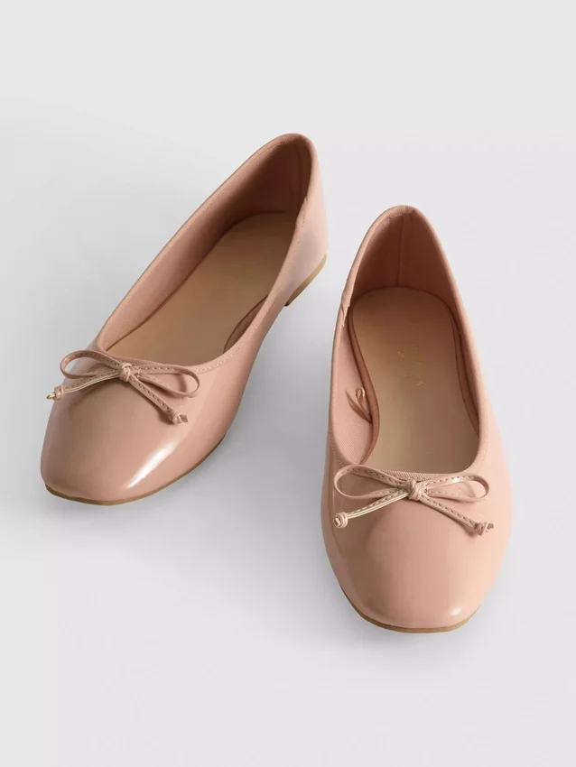 Bailarinas planas con lazo de imitación de cuero