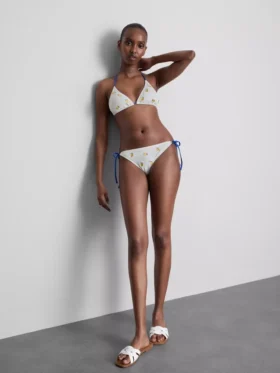 Bikini con braguita texturizada color limón y atado a los lados